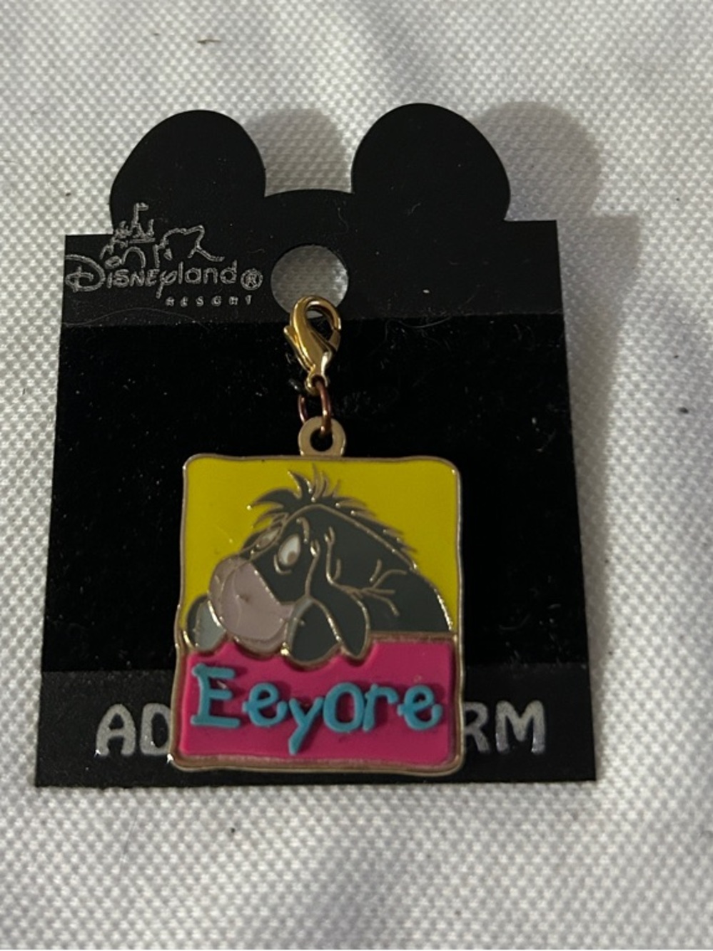 Disney Eeyore Square Enamel Charm in Yellow & Pink